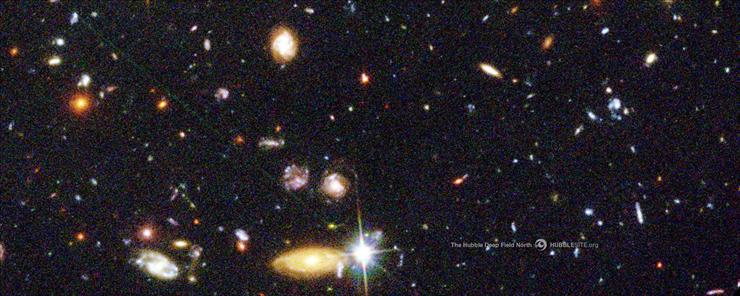 Tapety Zjawiskowe - Myriad Galaxies in Hubbles Deep Field Image.jpg